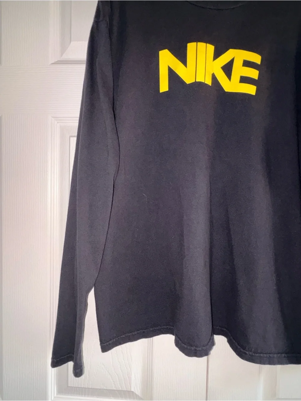 Nike Black Long-Sleeve Tee with Yellow Logo and Sleeve Text